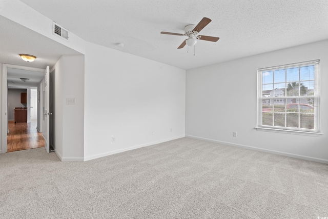2257 Andover Dr Unit A, Surfside Beach, SC 29575 - unfurnished room featuring carpet floors, ceiling fan, and a textured ceiling