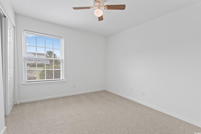 2257 Andover Dr Unit A, Surfside Beach, SC 29575 - empty room with light colored carpet and ceiling fan