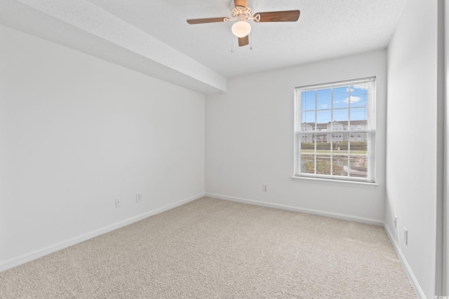 2257 Andover Dr Unit A, Surfside Beach, SC 29575 - empty room with light carpet, a ceiling fan, and a textured ceiling