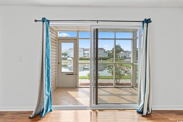 2257 Andover Dr Unit A, Surfside Beach, SC 29575 - doorway with wood finished floors and a water view