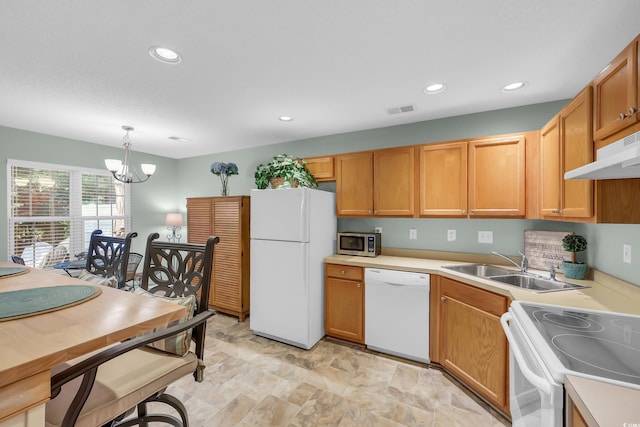 158 Palisade Loop Unit 158, Pawleys Island, SC 29585 - kitchen featuring white appliances, under cabinet range hood, a chandelier, recessed lighting, and light countertops