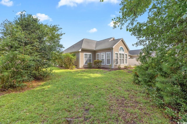 56 Willowbend Dr, Murrells Inlet, SC 29576 - back of house with a yard