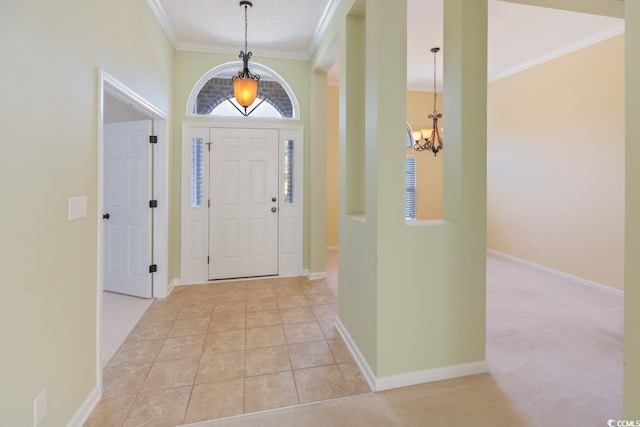 56 Willowbend Dr, Murrells Inlet, SC 29576 - foyer entrance with a chandelier and ornamental molding