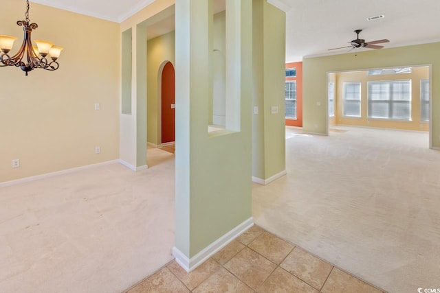 56 Willowbend Dr, Murrells Inlet, SC 29576 - hallway featuring light carpet, arched walkways, a chandelier, and crown molding