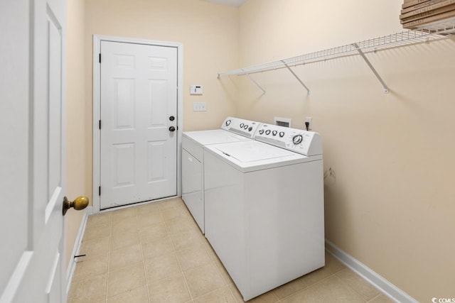 56 Willowbend Dr, Murrells Inlet, SC 29576 - washroom with washer and dryer and light tile patterned flooring