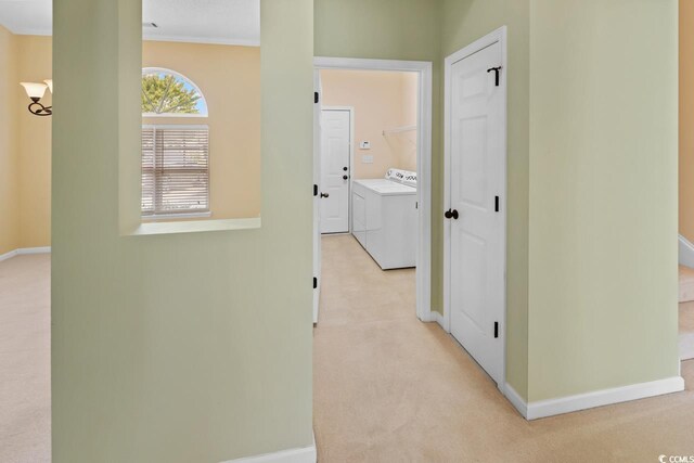 56 Willowbend Dr, Murrells Inlet, SC 29576 - corridor featuring light carpet, washing machine and dryer, and ornamental molding
