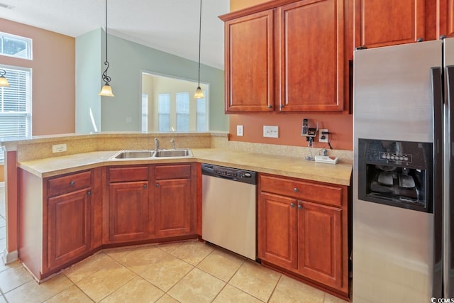 56 Willowbend Dr, Murrells Inlet, SC 29576 - kitchen featuring stainless steel appliances, light countertops, a peninsula, and light tile patterned floors
