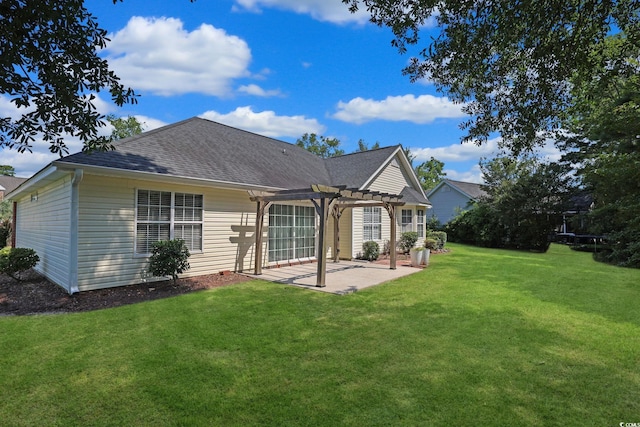 3888 Stillwood Dr, Myrtle Beach, SC 29588 - back of house with a pergola, a patio, a lawn, and roof with shingles