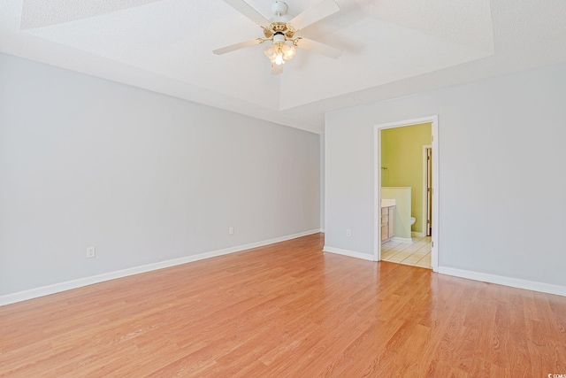 3888 Stillwood Dr, Myrtle Beach, SC 29588 - empty room with light wood-style floors and a ceiling fan