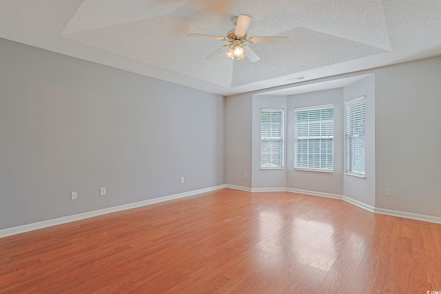 3888 Stillwood Dr, Myrtle Beach, SC 29588 - unfurnished room featuring a textured ceiling, light wood finished floors, and ceiling fan