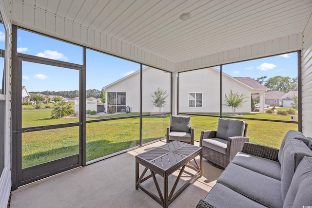 2143 Stonecrest Dr NW, Calabash, NC 28467 - sunroom / solarium featuring an outdoor living space and a residential view