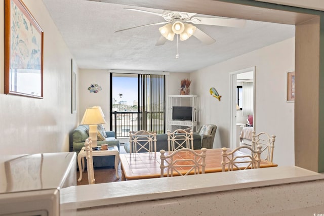 601 Mitchell Dr # 607, Myrtle Beach, SC 29577 - living area with ceiling fan and a textured ceiling