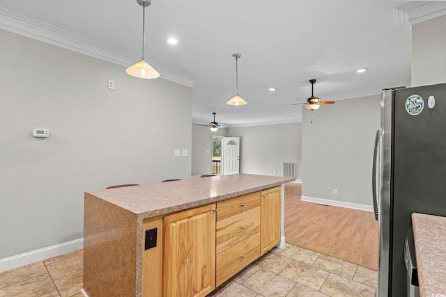 2135 Starduster Ln, Little River, SC 29566 - kitchen featuring freestanding refrigerator, a ceiling fan, crown molding, recessed lighting, and decorative light fixtures