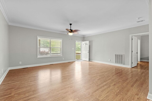 2135 Starduster Ln, Little River, SC 29566 - empty room featuring ceiling fan, ornamental molding, and wood finished floors