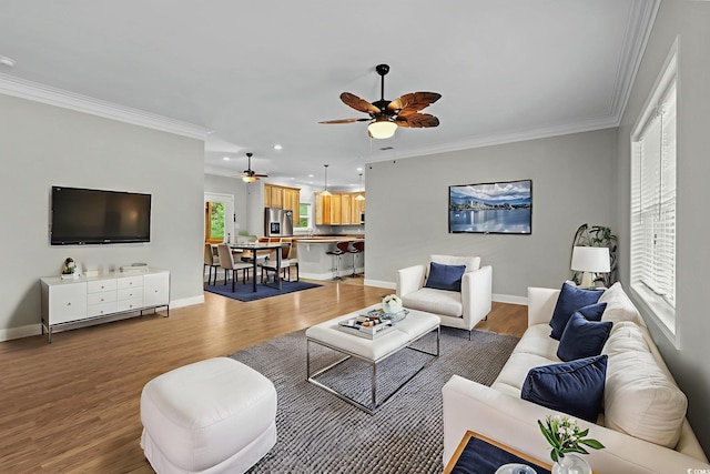 2135 Starduster Ln, Little River, SC 29566 - living room featuring ceiling fan, light wood-type flooring, crown molding, and recessed lighting