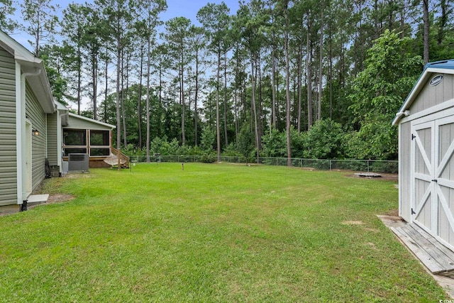 2135 Starduster Ln, Little River, SC 29566 - fenced backyard with a sunroom and a storage shed
