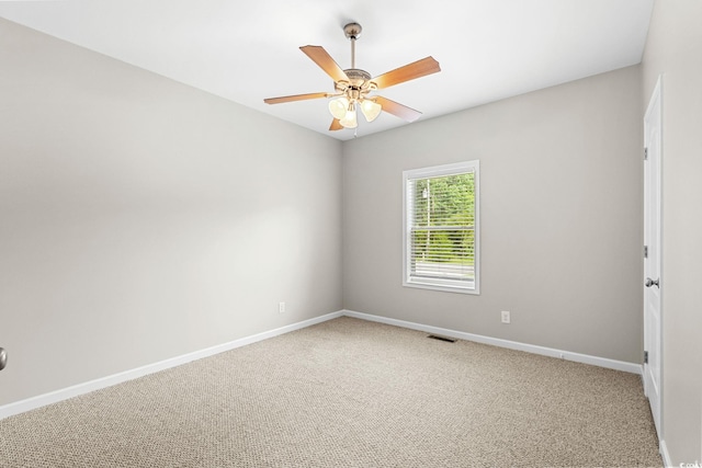 2135 Starduster Ln, Little River, SC 29566 - spare room featuring carpet flooring and a ceiling fan
