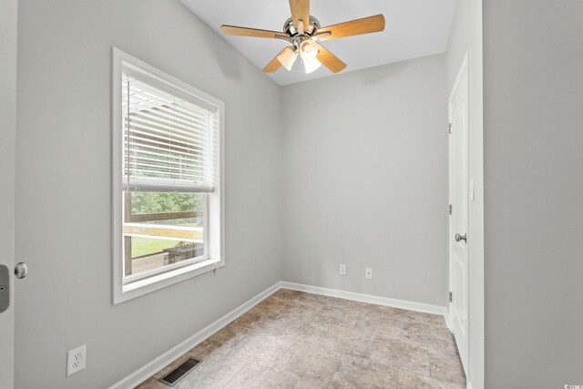 2135 Starduster Ln, Little River, SC 29566 - spare room featuring baseboards and a ceiling fan