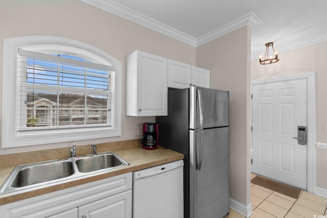 4872 Dahlia Ct Unit 305, Myrtle Beach, SC 29577 - kitchen featuring dishwasher, crown molding, white cabinetry, freestanding refrigerator, and light tile patterned floors
