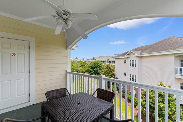 4872 Dahlia Ct Unit 305, Myrtle Beach, SC 29577 - balcony with a ceiling fan, outdoor dining space, and a residential view