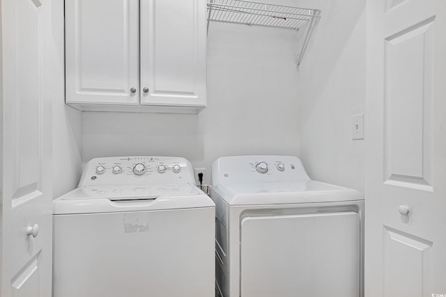 709 Jerdon Cir N, Myrtle Beach, SC 29582 - laundry area featuring washing machine and clothes dryer and cabinet space