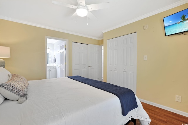 709 Jerdon Cir N, Myrtle Beach, SC 29582 - bedroom featuring wood finished floors, ornamental molding, a ceiling fan, ensuite bath, and multiple closets