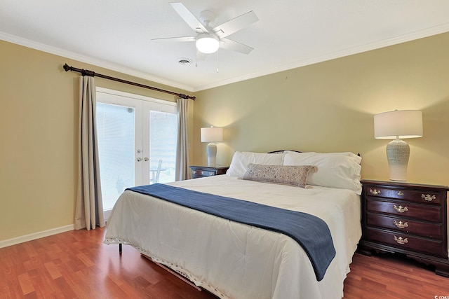 709 Jerdon Cir N, Myrtle Beach, SC 29582 - bedroom with access to exterior, wood finished floors, french doors, ornamental molding, and ceiling fan