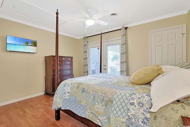 709 Jerdon Cir N, Myrtle Beach, SC 29582 - bedroom featuring access to exterior, wood finished floors, ornamental molding, and a ceiling fan