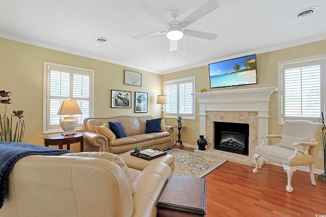 709 Jerdon Cir N, Myrtle Beach, SC 29582 - living area featuring crown molding, wood finished floors, a fireplace, and ceiling fan