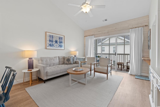 901 W Port Dr Unit 2114, North Myrtle Beach, SC 29582 - living area with high vaulted ceiling, ceiling fan, and light wood-style floors