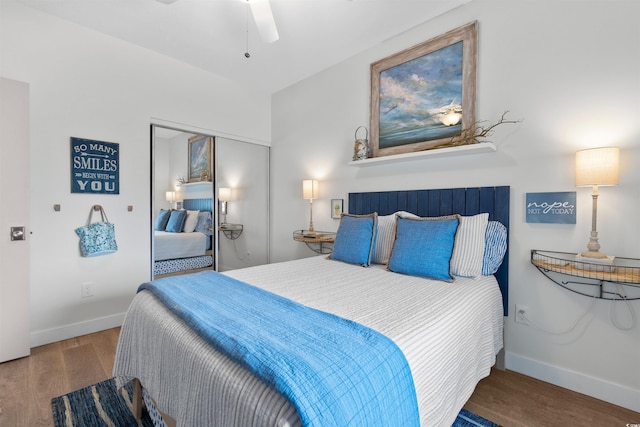 901 W Port Dr Unit 2114, North Myrtle Beach, SC 29582 - bedroom featuring wood finished floors, a closet, and a ceiling fan