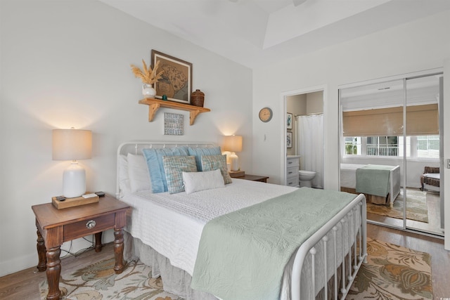 901 W Port Dr Unit 2114, North Myrtle Beach, SC 29582 - bedroom with wood finished floors and connected bathroom