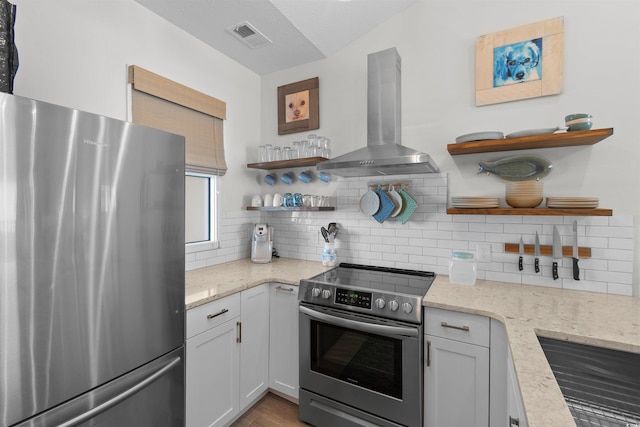 901 W Port Dr Unit 2114, North Myrtle Beach, SC 29582 - kitchen with appliances with stainless steel finishes, open shelves, wall chimney exhaust hood, and tasteful backsplash