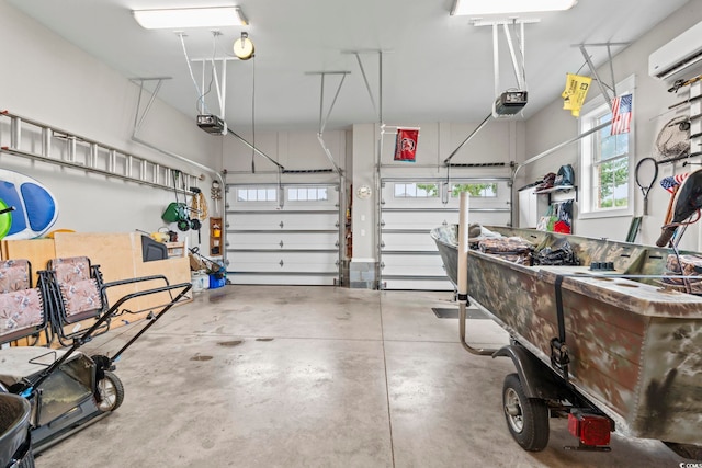 1106 Bluffton Ct, Myrtle Beach, SC 29579 - garage with an AC wall unit and a garage door opener