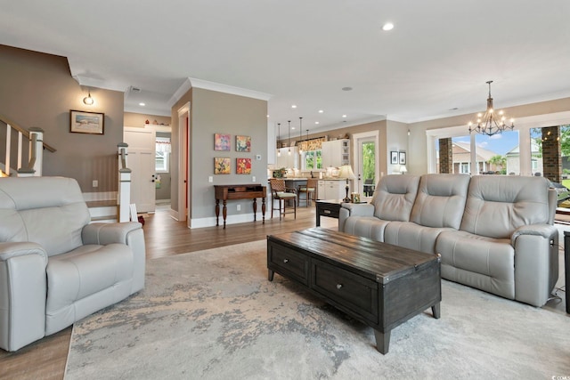 1106 Bluffton Ct, Myrtle Beach, SC 29579 - living area with a chandelier, crown molding, light wood-type flooring, and recessed lighting