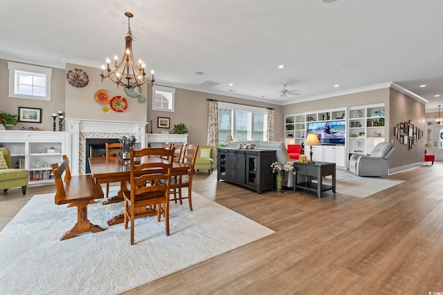1106 Bluffton Ct, Myrtle Beach, SC 29579 - dining room featuring ornamental molding, recessed lighting, a fireplace, wood finished floors, and ceiling fan