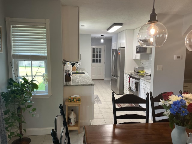 312 Trace Run, Myrtle Beach, SC 29588 - dining area featuring light tile patterned floors and baseboards