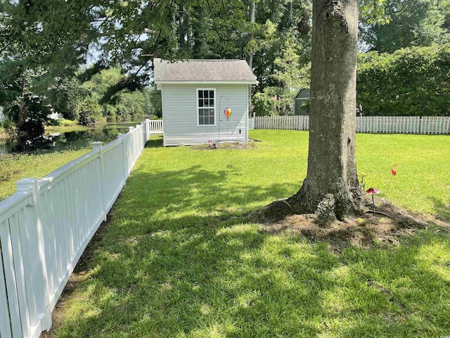 312 Trace Run, Myrtle Beach, SC 29588 - fenced backyard featuring an outbuilding and a water view