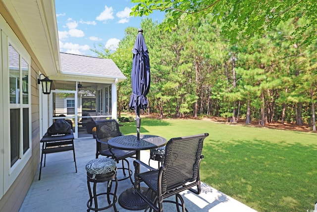 428 Arlington Cir, Murrells Inlet, SC 29576 - view of patio / terrace featuring a sunroom, outdoor dining space, and ceiling fan