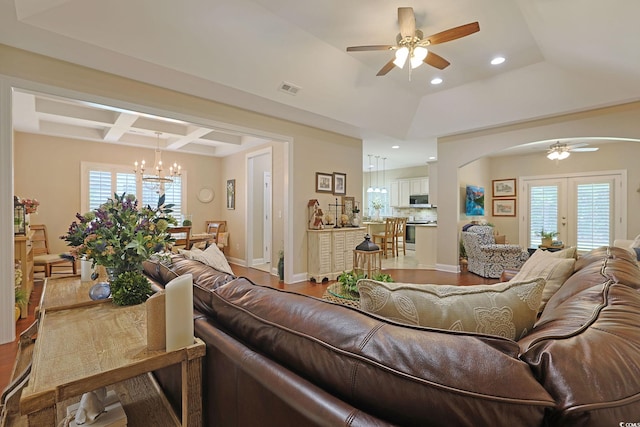 428 Arlington Cir, Murrells Inlet, SC 29576 - living room with a ceiling fan, arched walkways, a chandelier, recessed lighting, and coffered ceiling