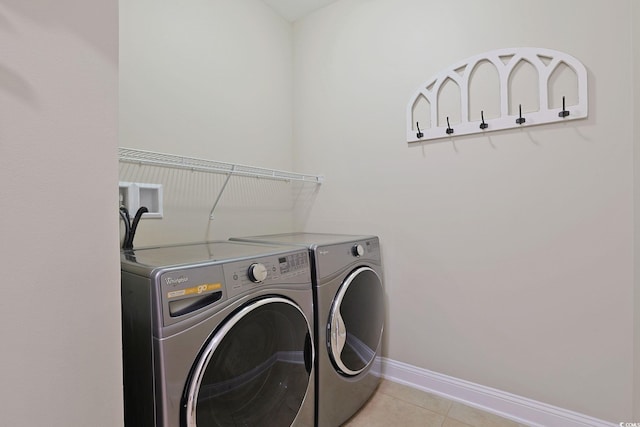 428 Arlington Cir, Murrells Inlet, SC 29576 - laundry room with separate washer and dryer and light tile patterned floors