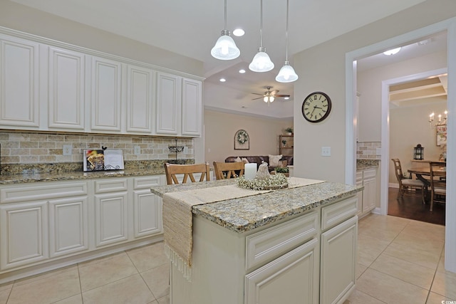 428 Arlington Cir, Murrells Inlet, SC 29576 - kitchen with light tile patterned flooring, tasteful backsplash, ceiling fan, recessed lighting, and a center island