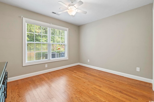 670 2nd Ave N, North Myrtle Beach, SC 29582 - spare room featuring light wood-style floors and a ceiling fan