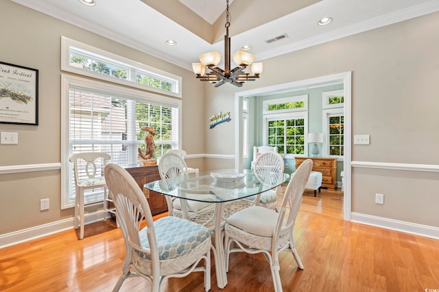 670 2nd Ave N, North Myrtle Beach, SC 29582 - dining room with ornamental molding, a chandelier, light wood-style floors, and recessed lighting