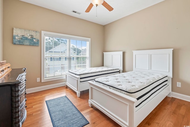 670 2nd Ave N, North Myrtle Beach, SC 29582 - bedroom featuring light wood-style floors and a ceiling fan