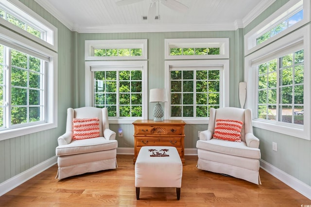 670 2nd Ave N, North Myrtle Beach, SC 29582 - sunroom / solarium with wood finished floors, crown molding, and plenty of natural light