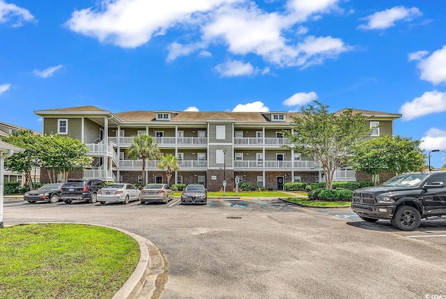 300 Kiskadee Loop Unit K, Conway, SC 29526 - view of apartment building / complex featuring uncovered parking