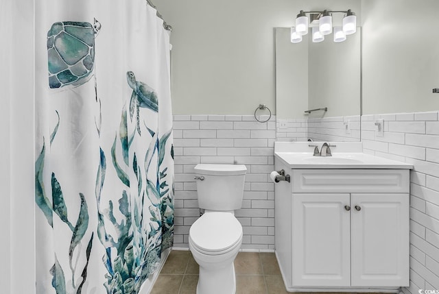 300 Kiskadee Loop Unit K, Conway, SC 29526 - bathroom featuring tile walls, tile patterned floors, vanity, a wainscoted wall, and a shower with curtain