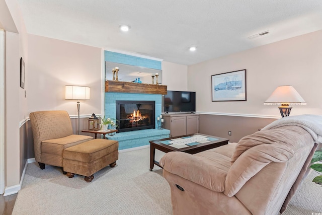 1575 Victoria Ln, Myrtle Beach, SC 29577 - carpeted living room with a fireplace and recessed lighting