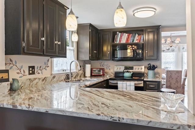1575 Victoria Ln, Myrtle Beach, SC 29577 - kitchen with black microwave, stainless steel electric range, light stone counters, a chandelier, and dark brown cabinets